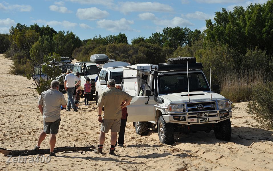 26-Convoy takes a break from the sand driving.JPG
